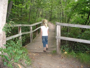 Mykala - Pretending to walk on the wooden bridge