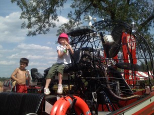 Mykala sitting on an air boat