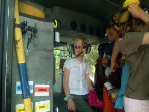 Mykala in a fire truck