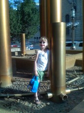 Mykala standing in the Orchestra Hall Fountain