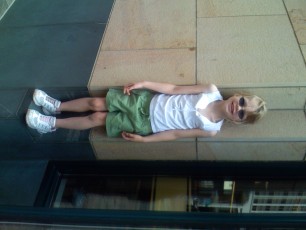 Mykala standing on a ledge