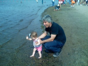 Rob and Lara playing on the beach at Lake Calhoun