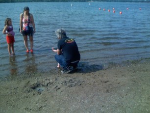 Rob and Lara playing on the beach at Lake Calhoun