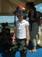 Mykala wearing fire fighter clothes