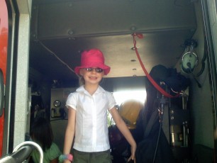 Mykala in a fire truck