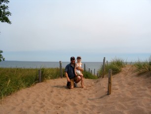 Mykala and Daddy on the beach at Park Point