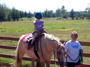 Mykala riding a horse