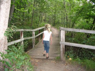 Mykala - Pretending to walk on the wooden bridge