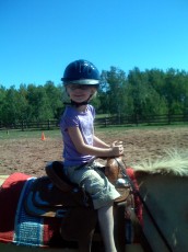 Mykala riding a horse