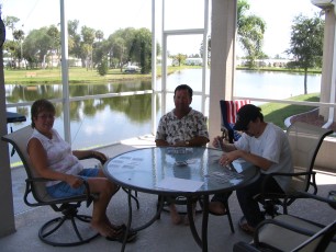 Me, mom and Rick playing cards