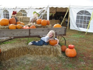 Mykala with some pumpkins at Sever's Corn Maze