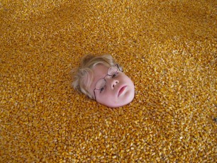 Mykala buried in corn