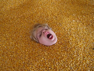 Mykala buried in corn