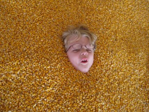 Mykala buried in corn