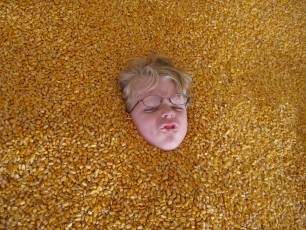 Mykala buried in corn