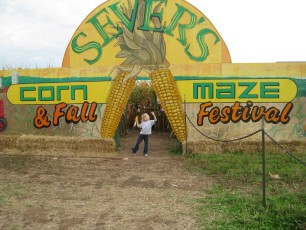 Mykala at the entrance to Sever's Corn Maze