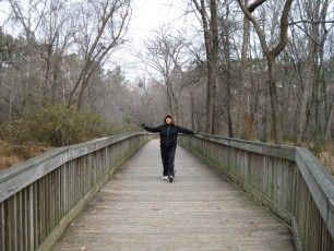 Corinne on a the long wooden bridge