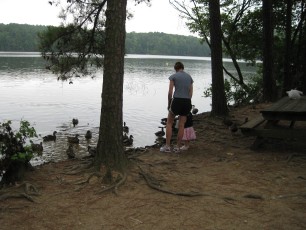 Emily and Bailey feeding the ducks.
