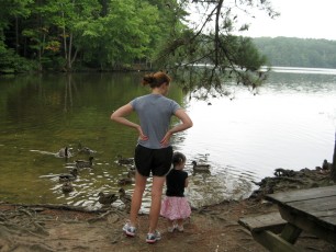 Emily and Bailey feeding the ducks.