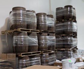Some wooden barrels in storage at the Dogfish Head Brewery.