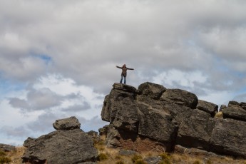 Corinne standing on a torre