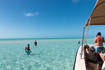 Stopped at a sandbar during low tide.