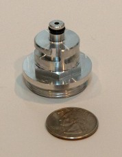 Custom bayonet quick disconnect adapter for high pressure CO2 cartridge.