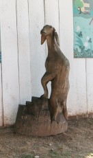 Strange double jointed goat carving